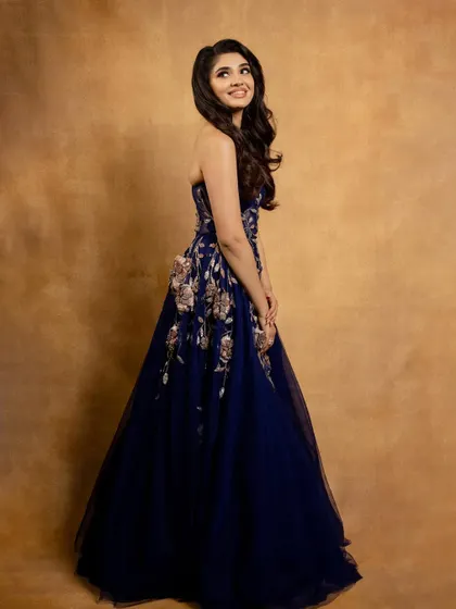 I styled the lovely Krithi Shetty for the Galatta awards in Chennai. This strapless navy blue tulle gown with floral embroidery creates a fairytale moment, perfect for a grand awards night.