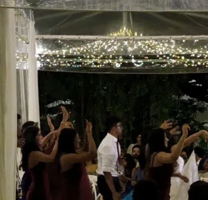 A retro-themed English wedding party. I have a vast collection of music to fit any theme, from classic rock to disco.