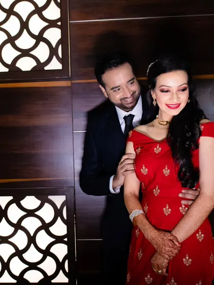A sweet and candid moment between the couple during their reception photoshoot.
