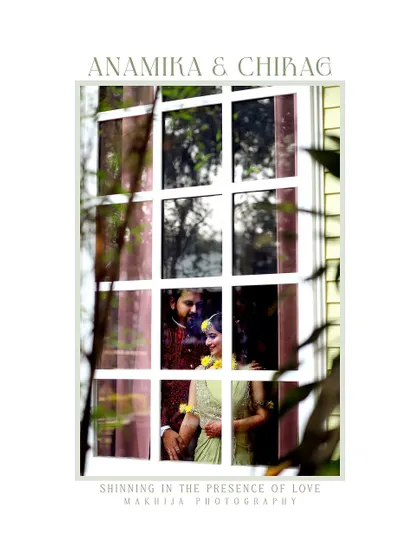 A creative shot from a Haldi ceremony, capturing a quiet moment between the couple through a window frame. It adds an artistic and intimate touch to the vibrant celebration.