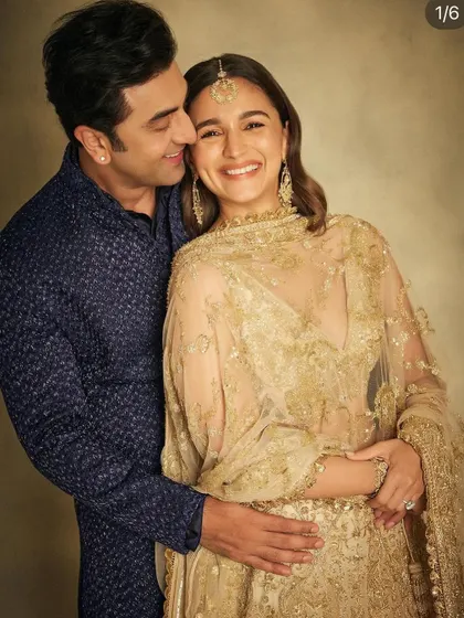 A heartwarming moment with Alia Bhatt and Ranbir Kapoor. Alia is wearing a full set of my handcrafted 18k gold jewelry, including earrings, a bracelet, and a maang tika.