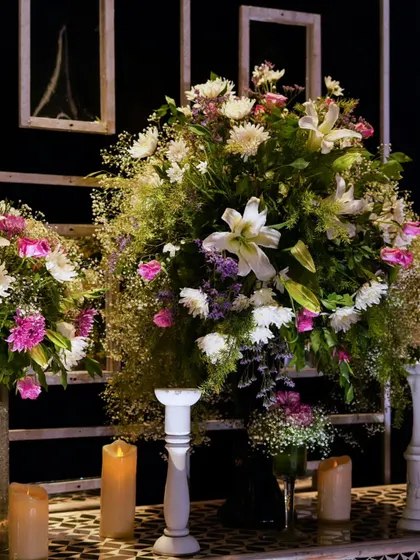 A close-up of the intricate floral arrangements, showcasing the variety of flowers and textures used to create these beautiful bouquets.