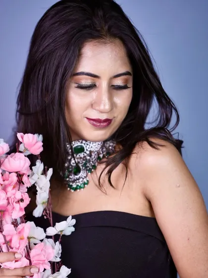 A softer portrait, showing how a statement piece can still look elegant and feminine.
