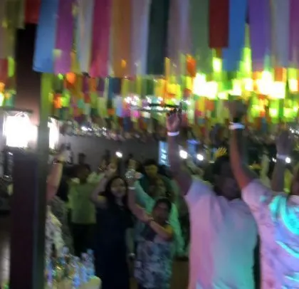 Hands in the air at the Colt corporate party.