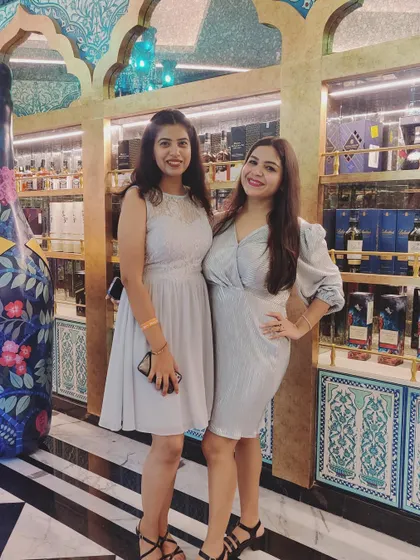 Another picture from the office party with a colleague. It's great to see everyone's personal style come out during these events.