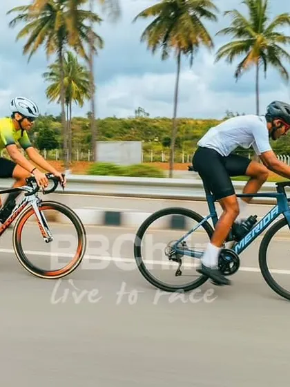 Two riders working together, sharing the effort of battling the wind. This kind of cooperation is essential in road racing.