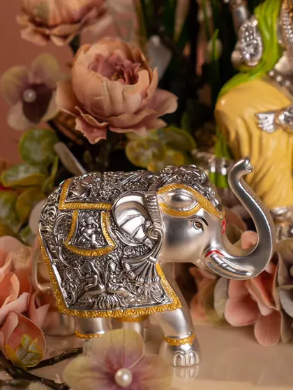 Bring prosperity home with this beautifully detailed silver elephant figurine. In Indian culture, the elephant is a symbol of strength, wisdom, and good fortune, making this a perfect decorative piece or gift.