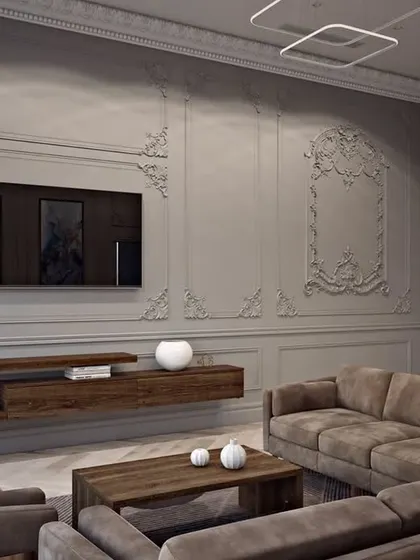 A formal living room with detailed wall mouldings and a floating media console, blending classical elements with modern functionality.