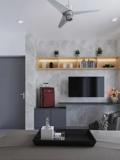 A 3D render of a guest bedroom, showing a wardrobe with unique perforated wood panels next to a floating TV console. The design balances modern grey tones with the warmth of natural wood.