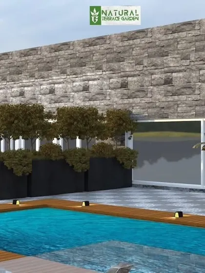 A proposed design for a rooftop with a small swimming pool. The render shows a wooden deck surrounding the pool, with a stone-clad wall and planters in the background.