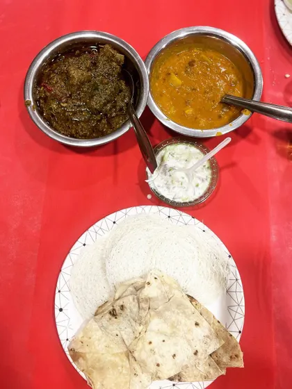 A comforting meal of Bhaji Gosht (mutton with spinach) and dal, served with soft rumali roti and neer dosa. We offer a range of classic main courses to complement our biryani.