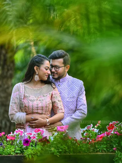 A close-up of the couple in a garden setting, with the focus on their loving gaze and the beautiful natural surroundings.