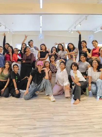 A group photo from Mekhola Bose's waacking workshop, celebrating a successful and energetic session.