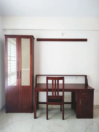 A frontal view of the minimalist home office furniture, showcasing its clean lines and warm wood finish.