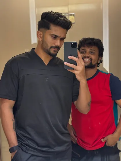 A final check of Nitish Kumar Reddy's haircut.