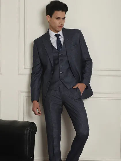 Whether you need a two-button, double-breasted, or three-piece suit, we have them all. This navy blue suit is a staple for any formal wardrobe.