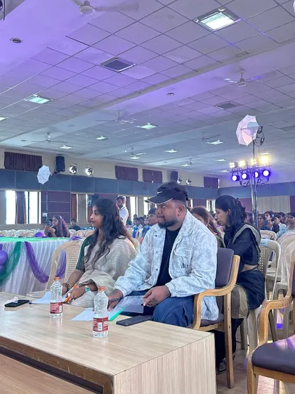 Another angle from the Seshadripuram competition, showing the judging environment. The energy from the crowd and performers is always incredible, and I feed off that while I work 💫