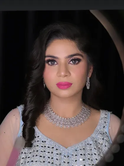A full portrait of the engagement bride, showing her beautiful colored lenses and flawless makeup.