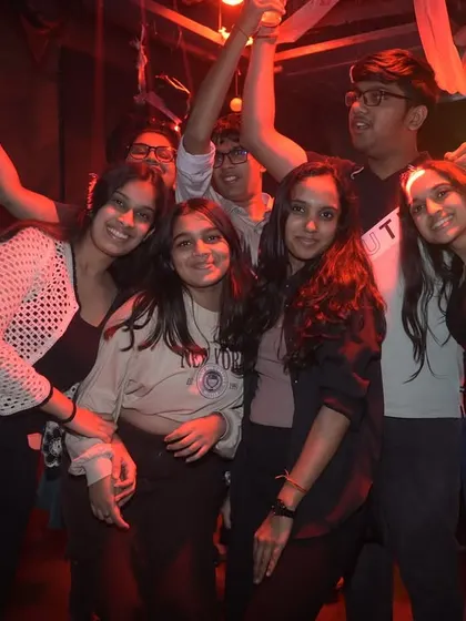More happy faces from the Halloween bash. It's all about creating a fun and immersive experience.