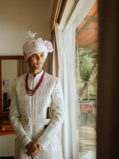 A classic portrait of the groom, moments before the ceremony begins. I capture these quiet, reflective moments to tell the complete story of your wedding day.