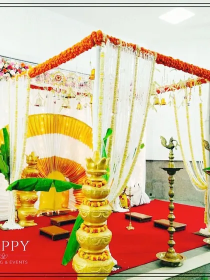 I create authentic traditional mandaps for sacred ceremonies. This setup, with its banana leaf pillars, brass diyas, and floral hangings, is ideal for a South Indian style naming ceremony or puja.