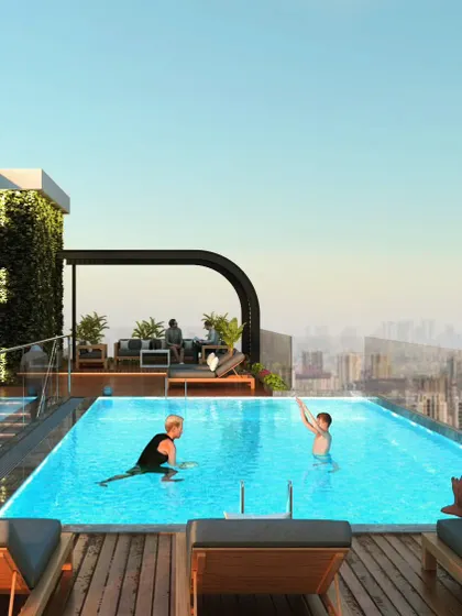 The rooftop infinity pool at Haresh Bhuvan, a residential project designed to offer urban tranquility and luxury living with stunning city views.