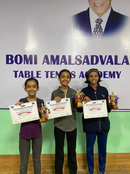 A group of our young female players with their trophies and certificates after a successful 1st Thane District Ranking Table Tennis Tournament.