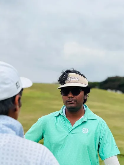 Senior Coach Hari is our quiet force, Mr. Dependable. He brings technical precision, using video analysis and smart planning to help every student train with purpose. He is our data brain and planning expert.