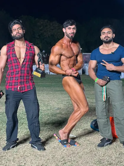 Another pose with my client and his trophy. Every competition is a learning experience.