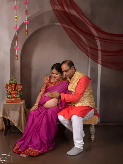 Another loving moment between the couple, seated together in the traditional setup. Their connection is the heart of the photo.