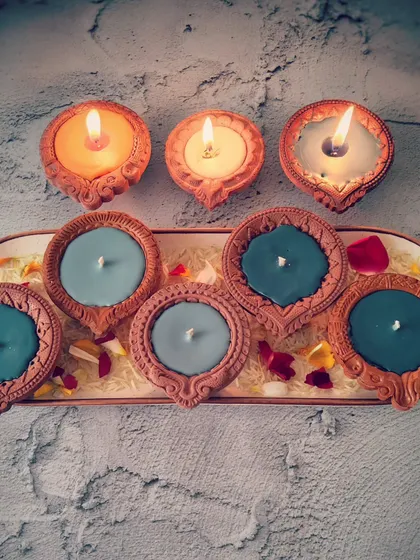 The beautiful contrast between the lit and unlit Diya Candles. The gentle glow adds so much warmth and positive energy to a room.