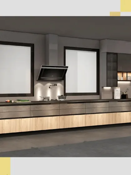 A long shot of the galley-style layout, emphasizing the clean horizontal lines of the handleless drawers and the balance between the dark stone and light wood finishes.
