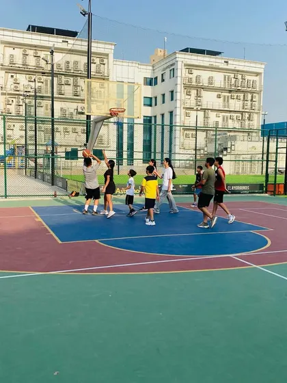 A player takes a shot during an evening game.
