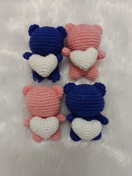 Another view of the heart-holding bear charms. They are small, adorable, and a great way to share a little bit of handmade love.