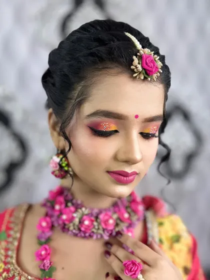 Another beautiful shot of the Haldi makeup, with a focus on the bright and colourful eyeshadow.