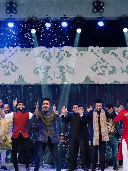 The men of the family united on stage for an energetic and fun-filled group performance.