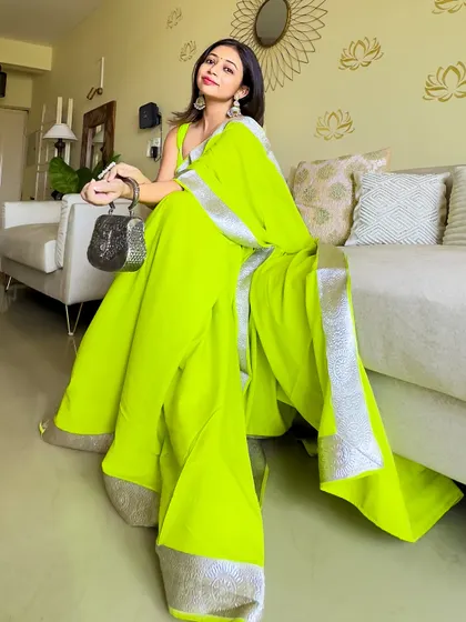 Don't let anyone tell you what colours to wear! I believe in rocking what makes you feel confident, like this vibrant neon green saree. It’s a timeless colour that always makes a statement, perfect for my Brown Girlies.