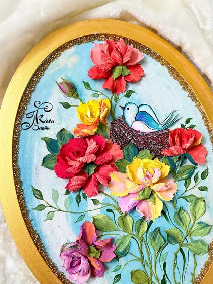A slightly different angle of the bird's nest panel, showing the depth of the sculpted roses and the delicate, trailing vines.