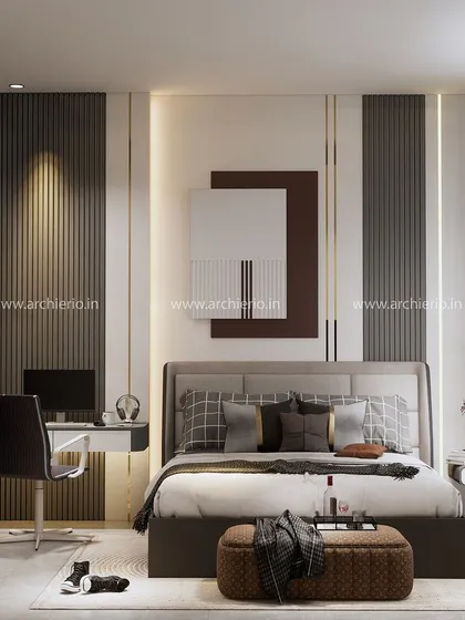 A sophisticated master bedroom for him, featuring a dark, moody color palette and clean lines. The design includes a sleek study area and a glass-paneled wardrobe for a modern, masculine feel.