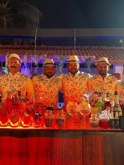 Our crew dressed in matching floral shirts and hats for a themed party. We love to get into the spirit of the event and add to the festive atmosphere.
