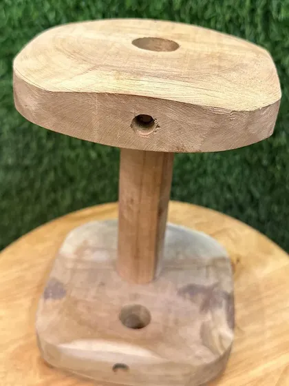 A different angle of the wooden training dumbbell. The design ensures it's easy for the dog to pick up and hold correctly. The quality of the wood means it can withstand being dropped and retrieved many times.