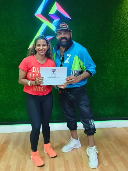 Receiving my Pro Skills training certificate from my mentor. This program armed me with new skills to be an even better instructor and presenter.