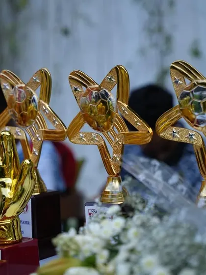 The Golden Glove and Star Player trophies, recognizing the best goalkeepers and standout performers.