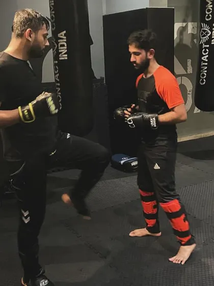 Two students practice their blocking and striking. This kind of partner work is key to understanding how techniques work against a live person.