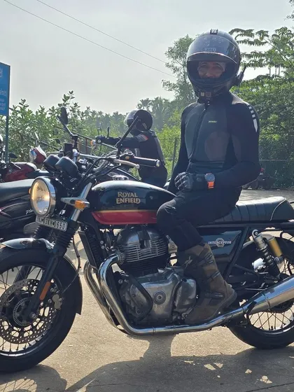 A shot of me on the Royal Enfield Interceptor, wearing full riding gear including boots and jacket.