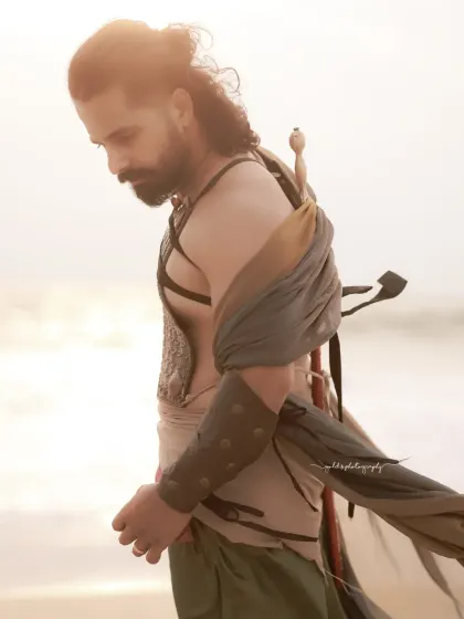 A male warrior concept shoot on the beach. Using the natural landscape and strong, directional light, I created a series of intense and heroic portraits of an actor, complete with a sword and styled costume.
