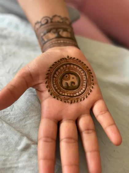 A close-up of the single-hand elephant mandala, a perfect design for an engagement ceremony.