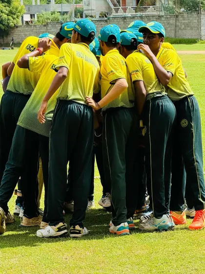 A team huddle before taking the field in Chennai, a ritual that builds camaraderie and prepares the players for the challenge ahead.