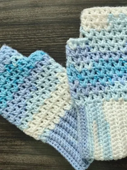 These ombre fingerless gloves in shades of blue and white are so dreamy. The yarn creates a beautiful gradient effect, making each pair unique.