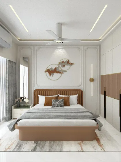 A luxurious master suite design. The wall behind the bed features classic molding and a modern metal art piece. The wardrobe has a unique dual-finish design with fluted wooden panels and handle-less shutters.